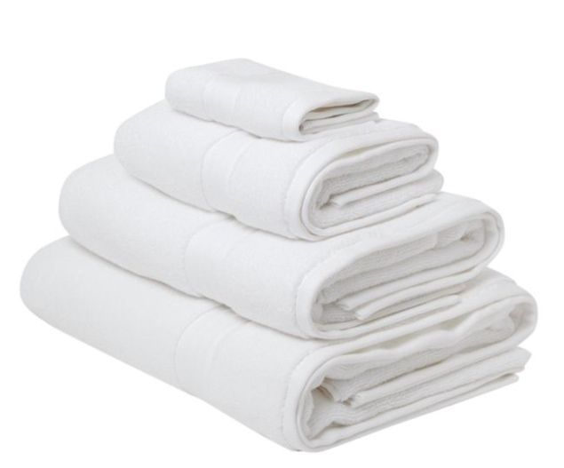 A neat pile of white towels